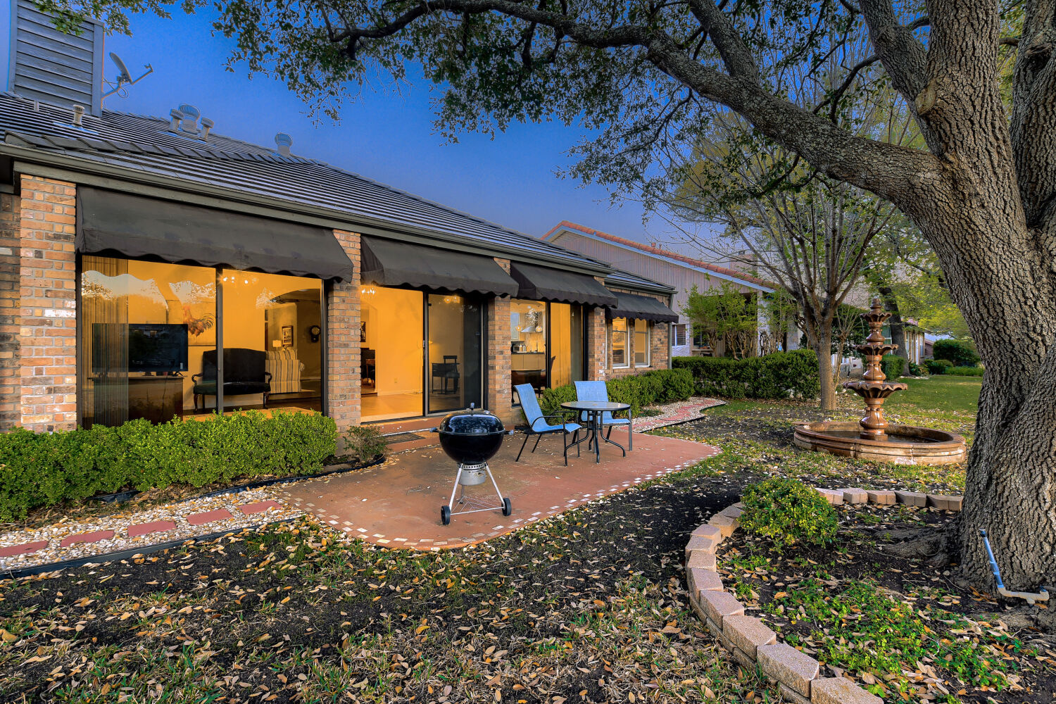 10904 Legends Lane Austin, TX 78747 - Photo 31 of 36 a view of a backyard with sitting area