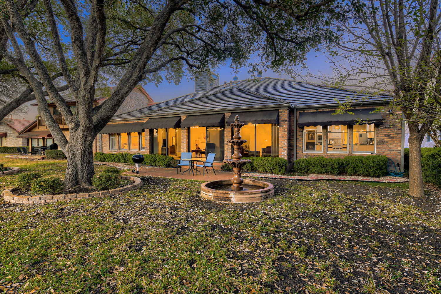 10904 Legends Lane Austin, TX 78747 - Photo 32 of 36 a view of a backyard with garden and patio