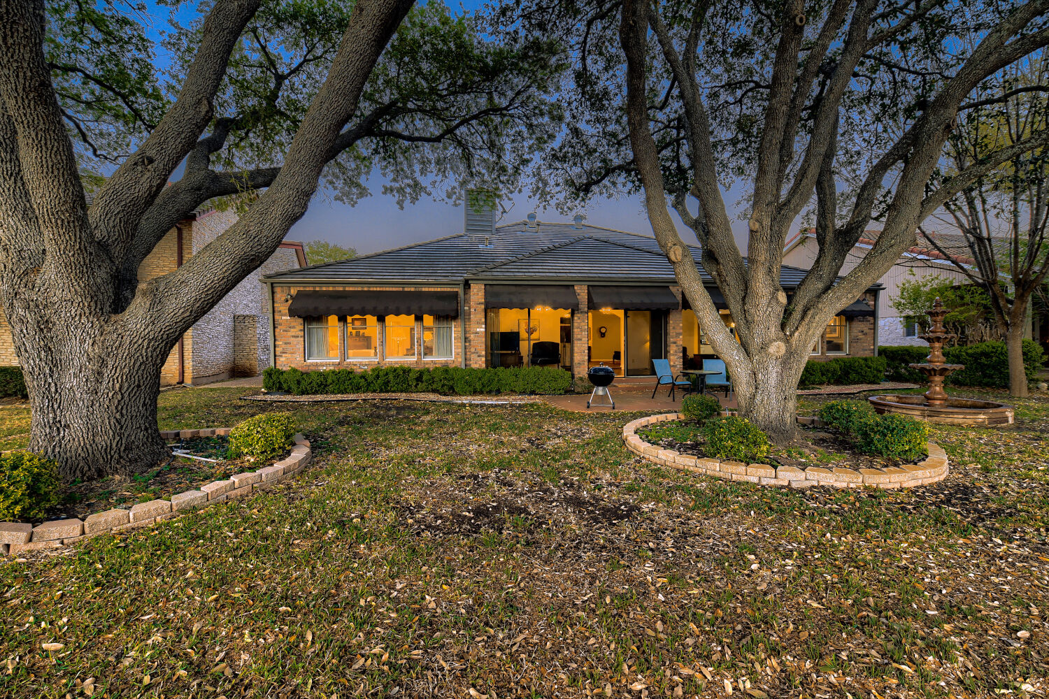 10904 Legends Lane Austin, TX 78747 - Photo 34 of 36 a backyard of a house with lots of green space