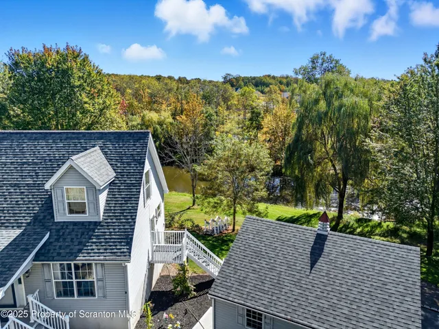a front view of a house with swimming pool