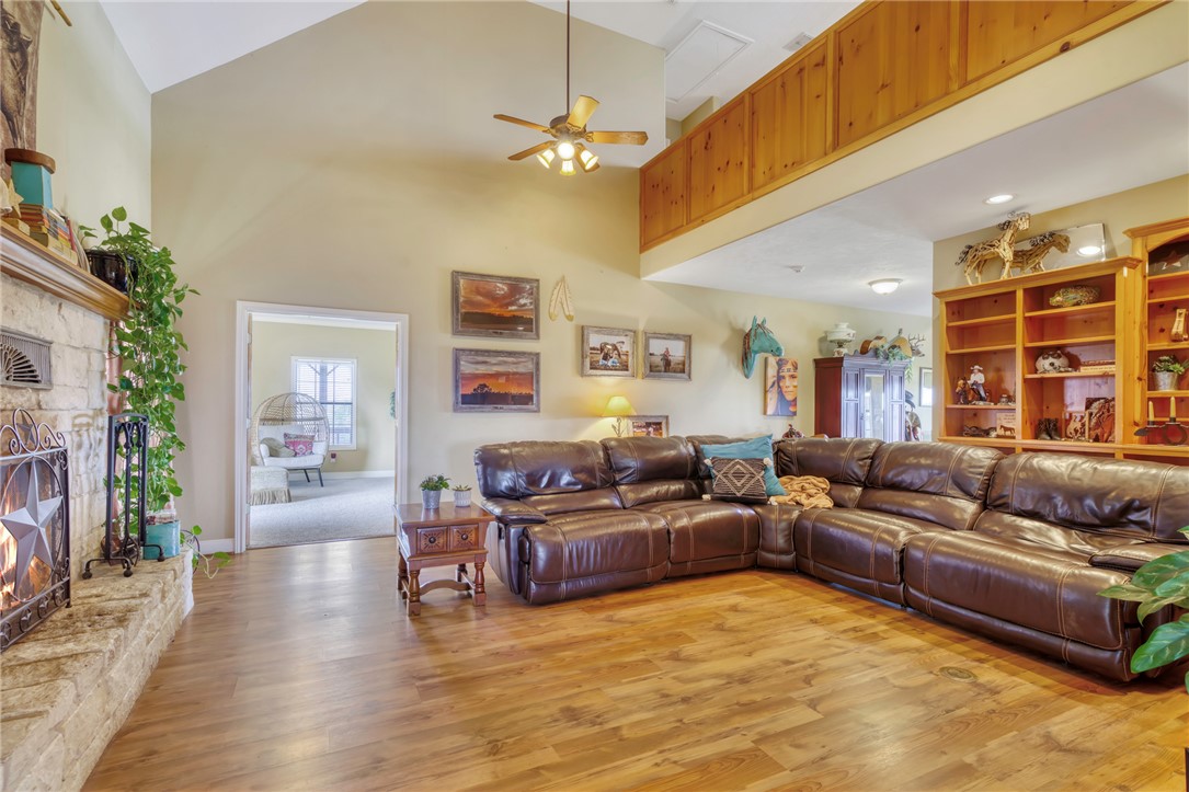 4404 County Road 151 Centerville, TX 75833 - Photo 13 of 48 a living room with furniture and a fireplace