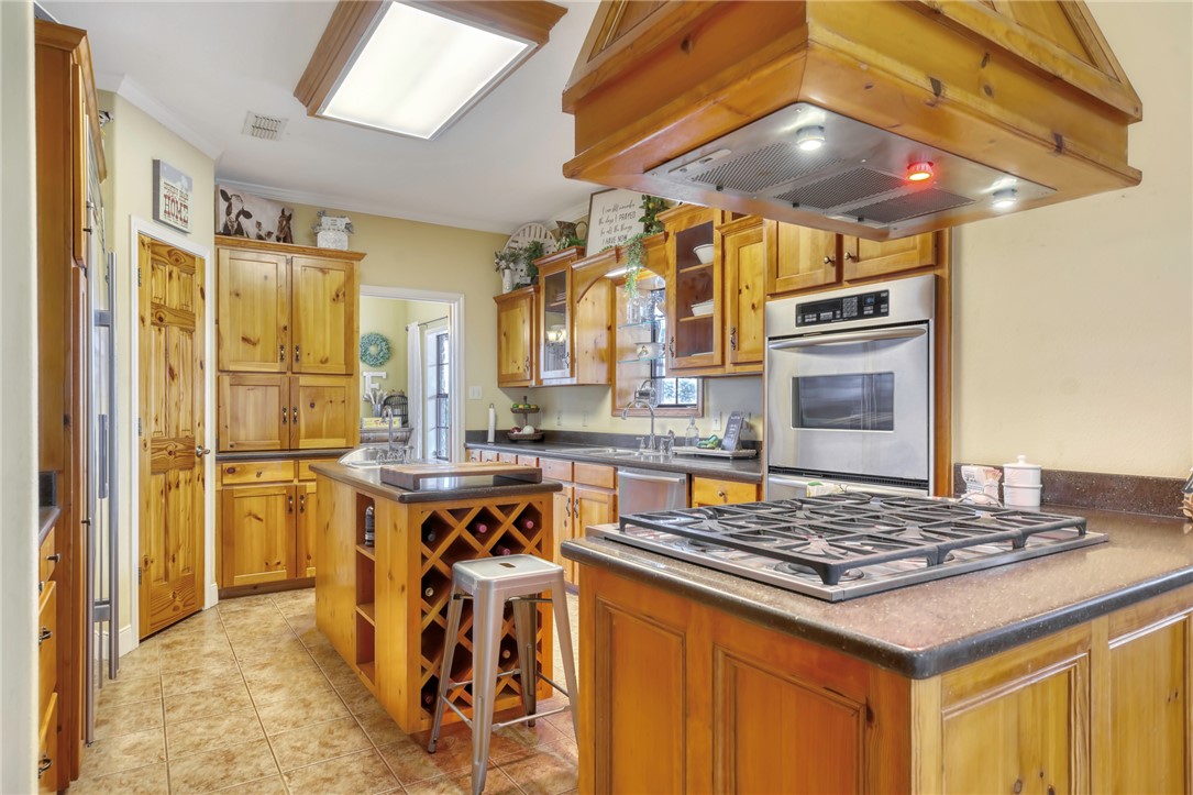 4404 County Road 151 Centerville, TX 75833 - Photo 15 of 48 a kitchen with a table and chairs in it