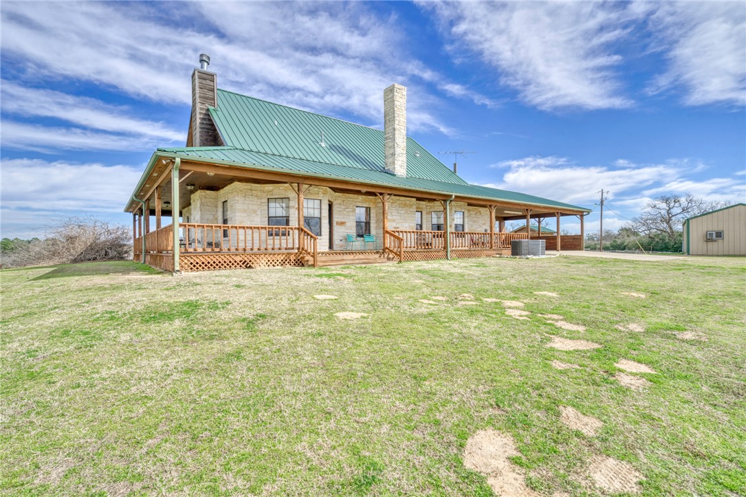 4404 County Road 151 Centerville, TX 75833 - Photo 29 of 48 a view of a house with a big yard