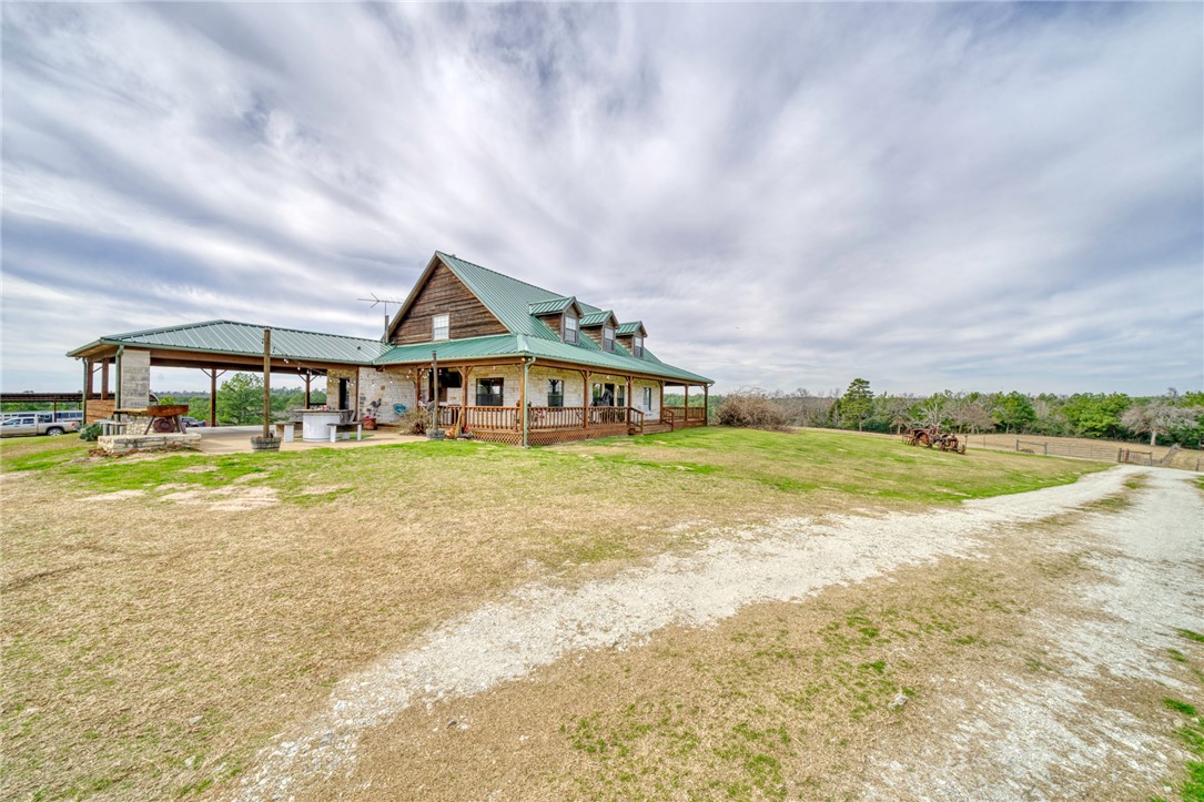 4404 County Road 151 Centerville, TX 75833 - Photo 3 of 48 a view of a house with swimming pool and ocean view