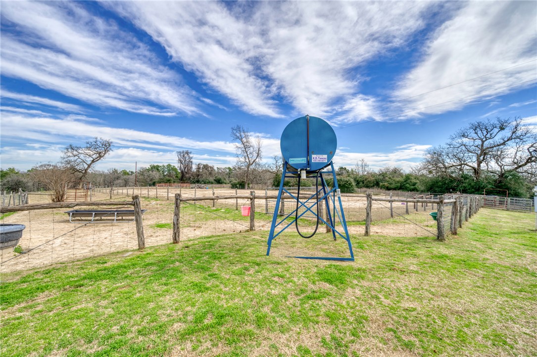 4404 County Road 151 Centerville, TX 75833 - Photo 36 of 48 a swimming pool with outdoor seating and garden
