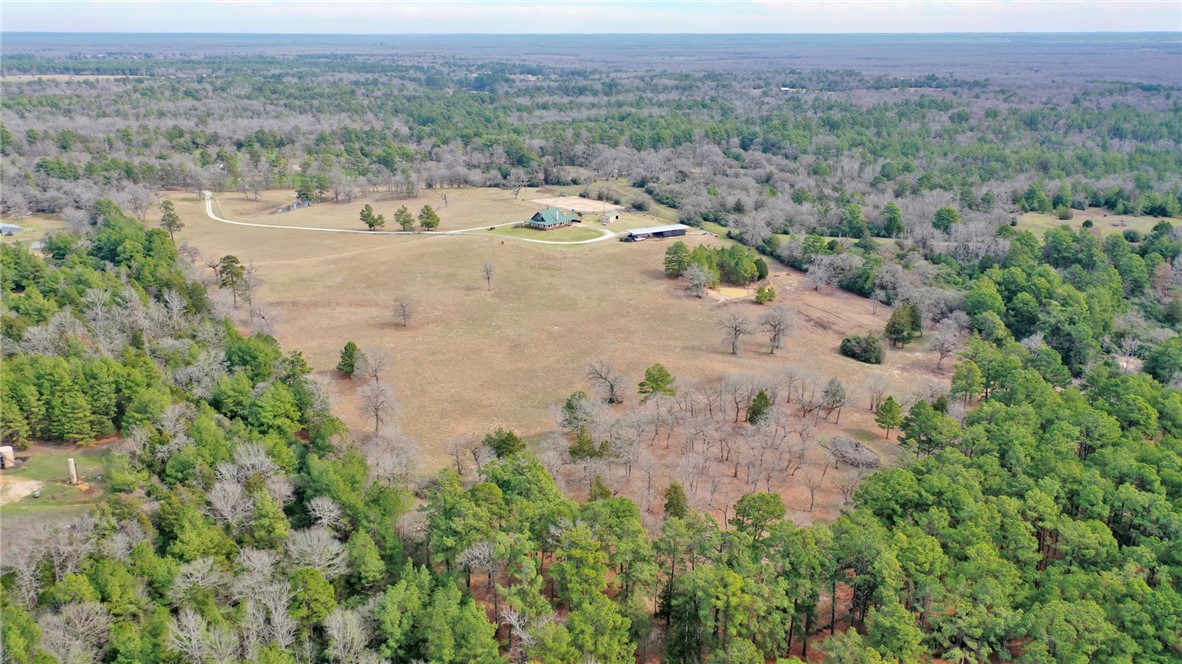 4404 County Road 151 Centerville, TX 75833 - Photo 47 of 48 an aerial view of a houses with a yard