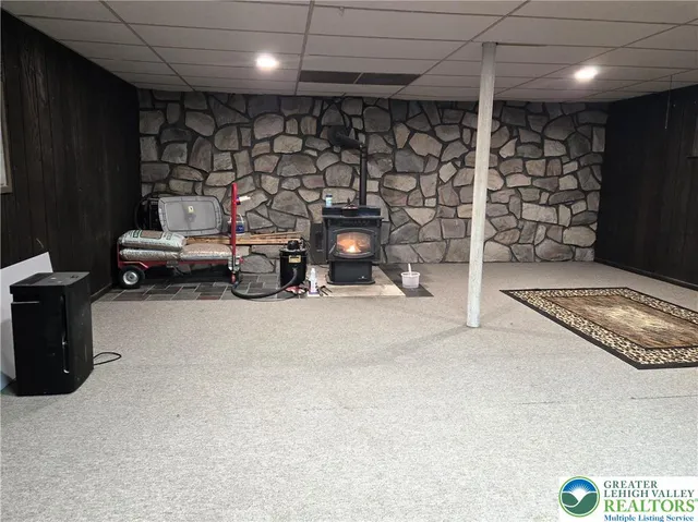 a view of an empty room with a wooden door