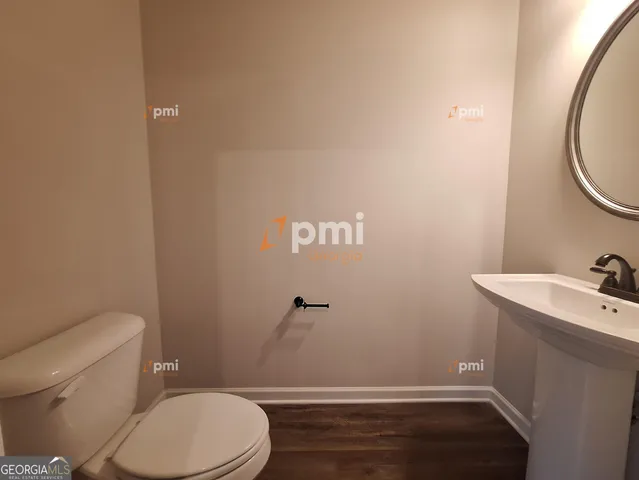 a bathroom with a sink and a toilet