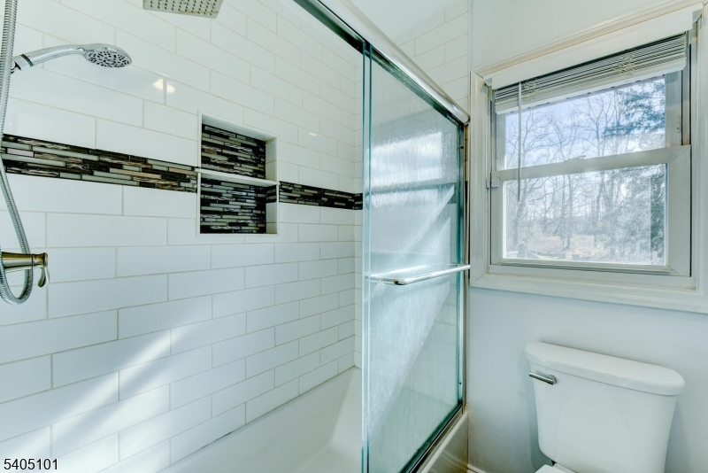 6 Elm Avenue Warren, NJ 07059 - Photo 18 of 29 a bathroom with a shower and a toilet
