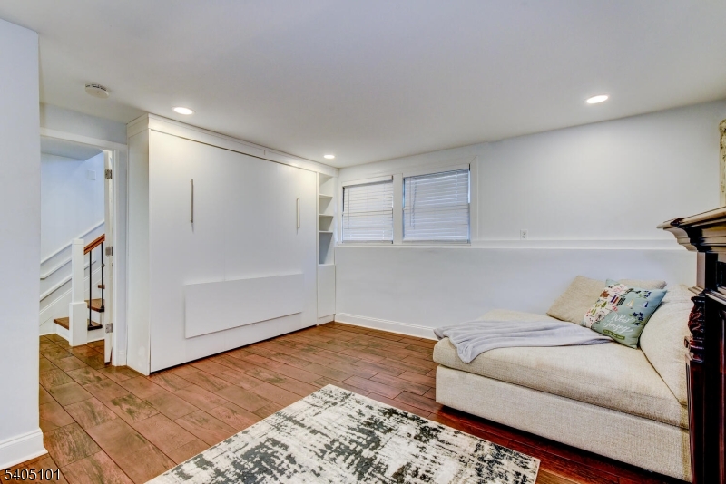 6 Elm Avenue Warren, NJ 07059 - Photo 22 of 29 a bedroom with a bed and a couch