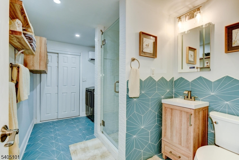 6 Elm Avenue Warren, NJ 07059 - Photo 23 of 29 a bathroom with a sink toilet and shower