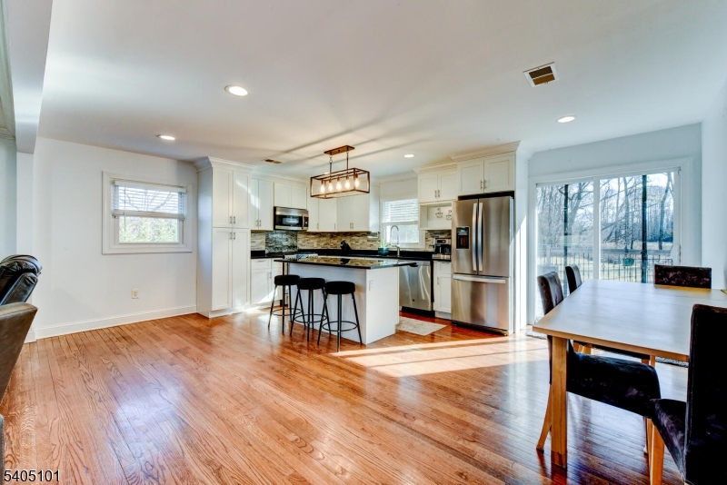 6 Elm Avenue Warren, NJ 07059 - Photo 5 of 29 a kitchen with a refrigerator and a stove top oven