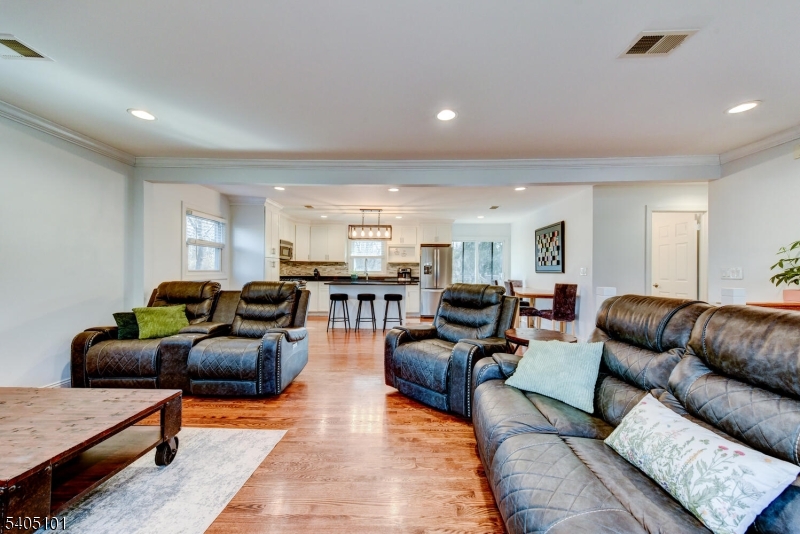 6 Elm Avenue Warren, NJ 07059 - Photo 8 of 29 a living room with furniture and view of kitchen