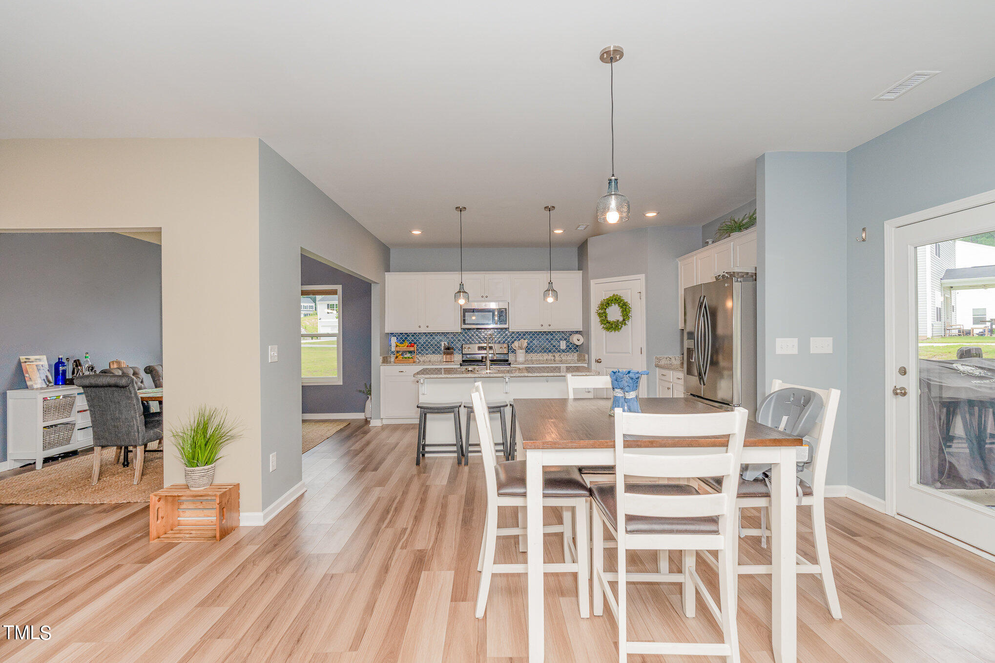 15 New Spring Way Franklinton, NC 27525 - Photo 11 of 41 a view of a dining room with furniture window and wooden floor