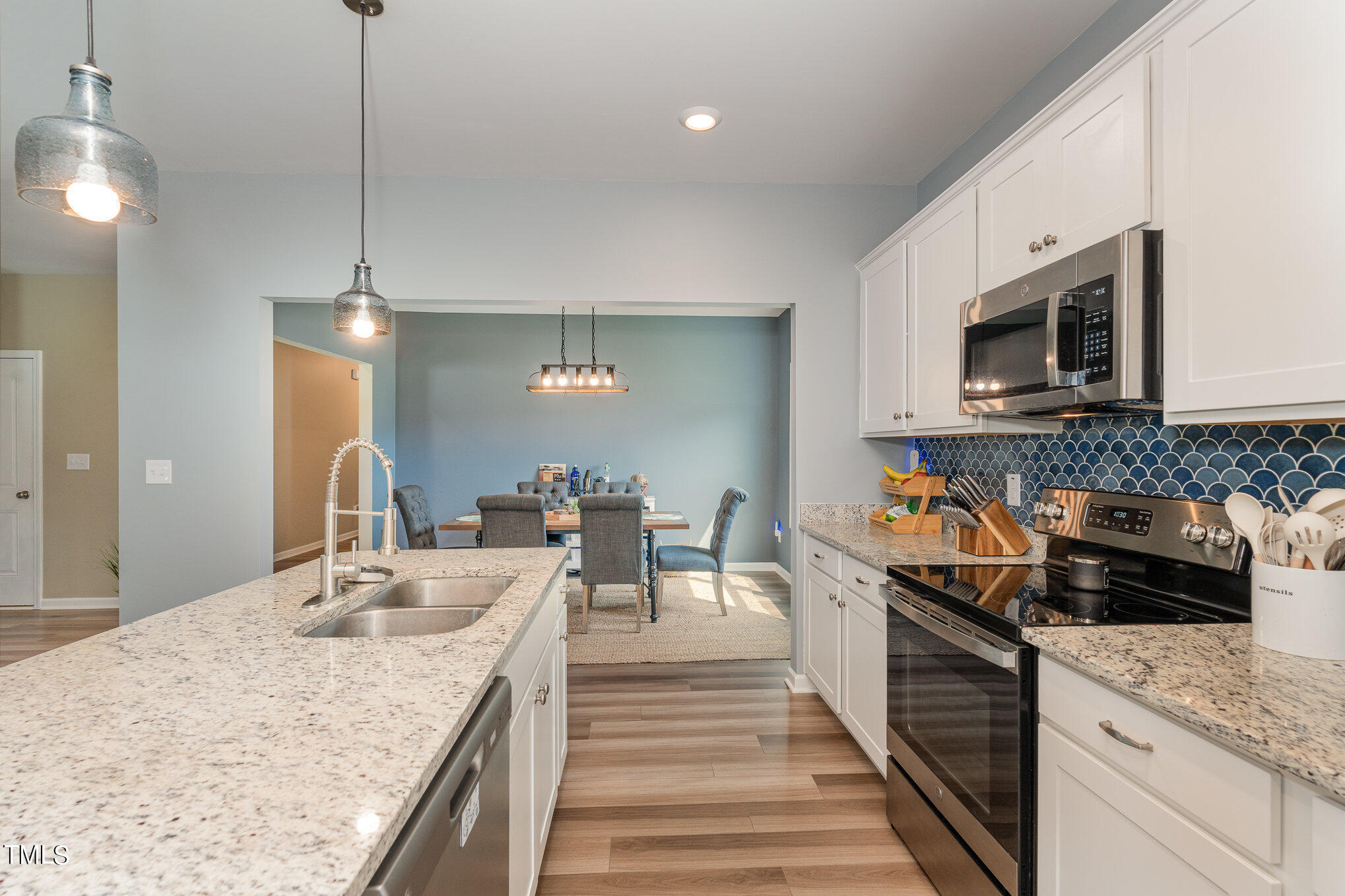 15 New Spring Way Franklinton, NC 27525 - Photo 15 of 41 a kitchen with granite countertop lots of counter top space