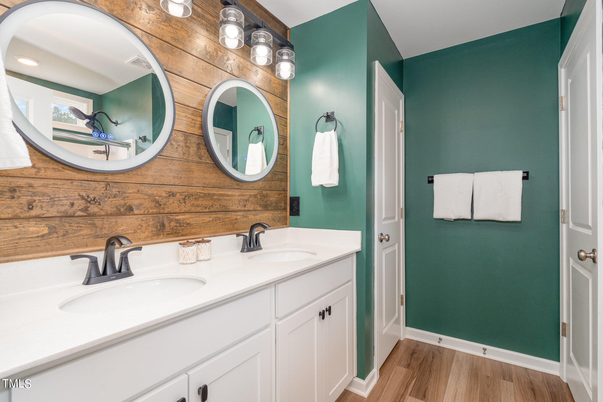 15 New Spring Way Franklinton, NC 27525 - Photo 24 of 41 a bathroom with a mirror and a sink