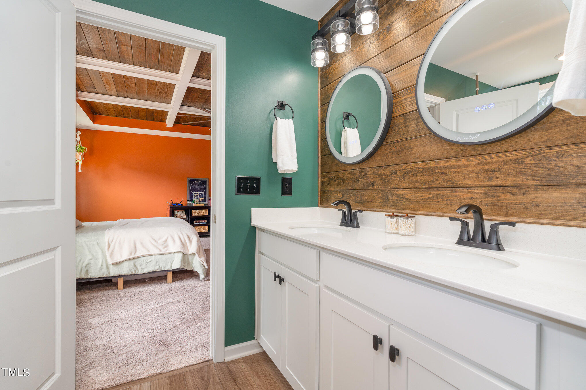 15 New Spring Way Franklinton, NC 27525 - Photo 25 of 41 a en suite bathroom with a double vanity sink and a mirror