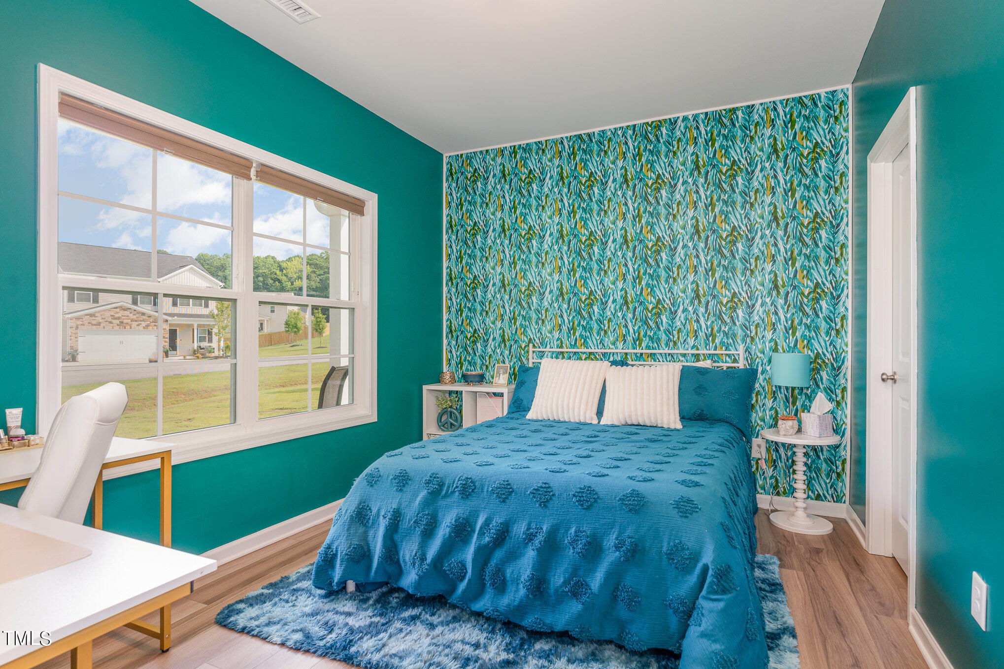 15 New Spring Way Franklinton, NC 27525 - Photo 26 of 41 a view of a room that has a bed and a table in it