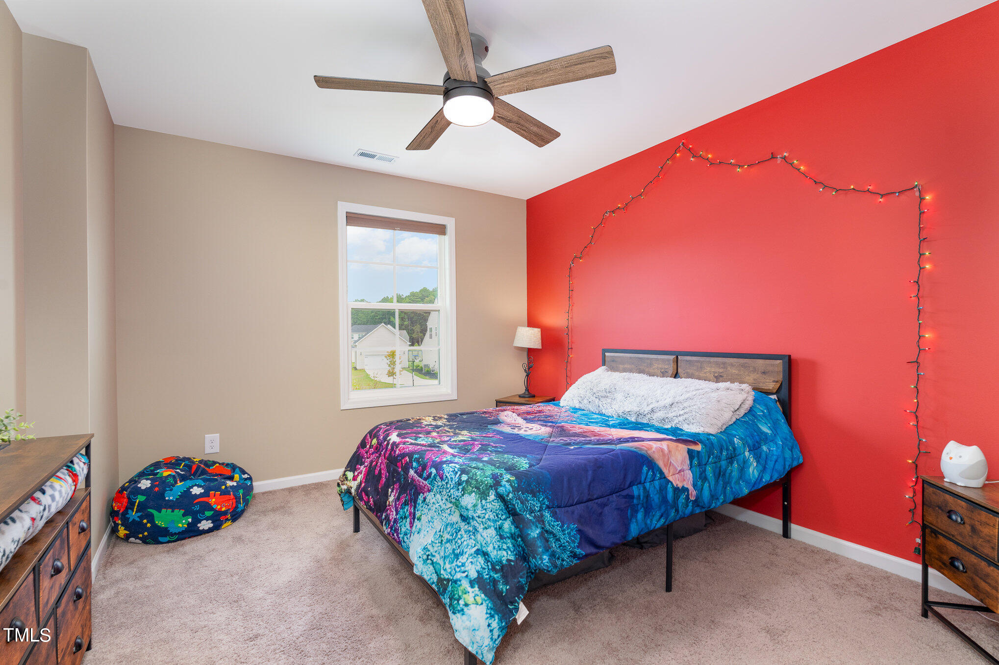 15 New Spring Way Franklinton, NC 27525 - Photo 27 of 41 a bedroom with a bed and a dresser next to a window