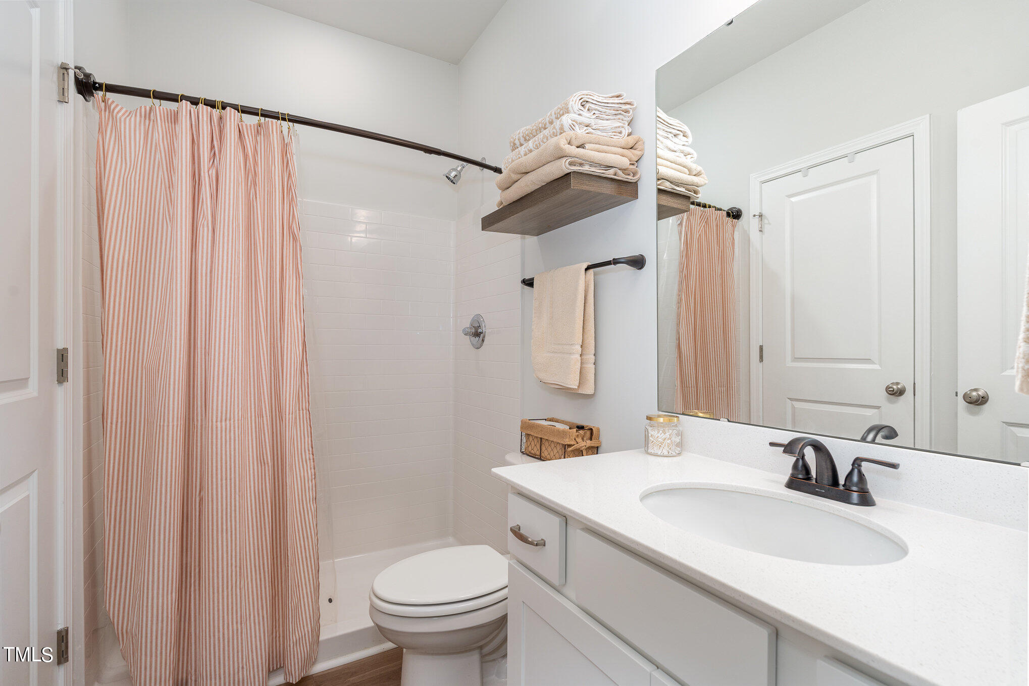 15 New Spring Way Franklinton, NC 27525 - Photo 30 of 41 a bathroom with a sink a toilet and shower