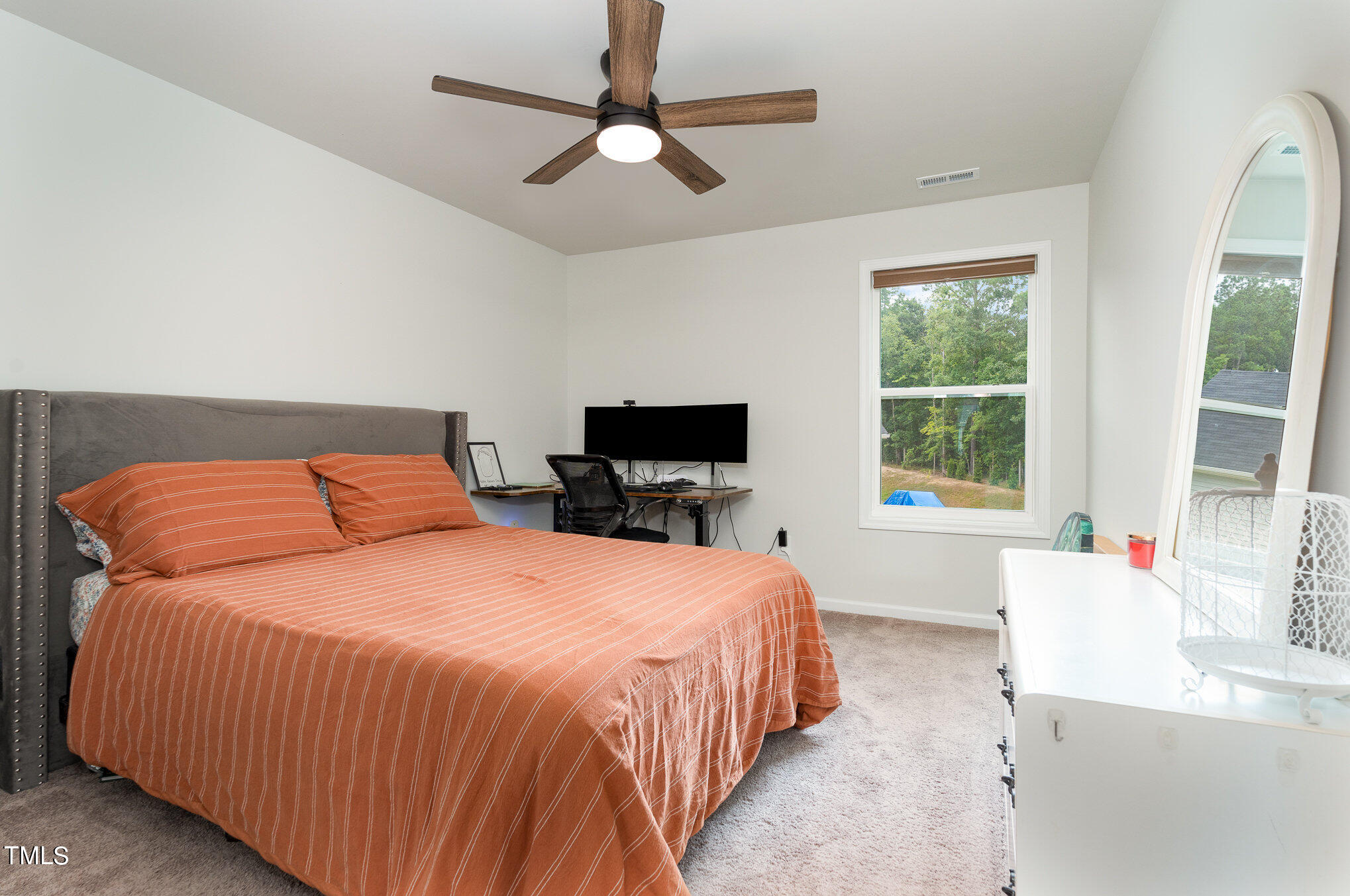 15 New Spring Way Franklinton, NC 27525 - Photo 31 of 41 a bedroom with a bed and a flat screen tv
