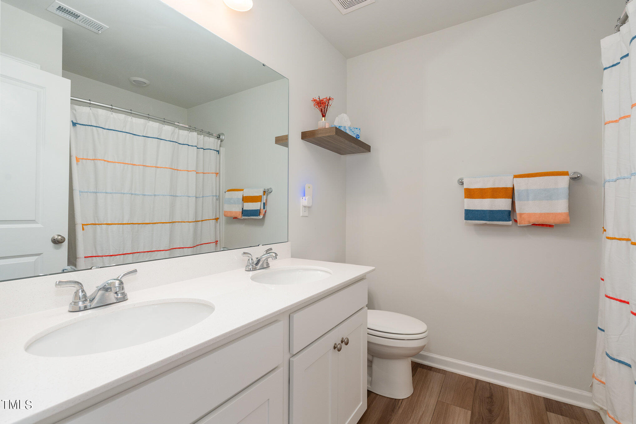 15 New Spring Way Franklinton, NC 27525 - Photo 33 of 41 a bathroom with a sink toilet and shower