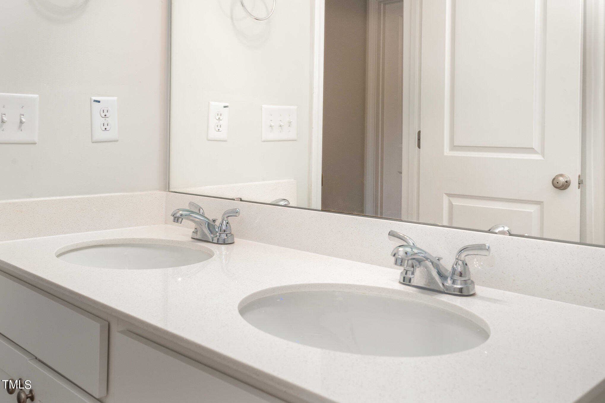15 New Spring Way Franklinton, NC 27525 - Photo 34 of 41 a bathroom with double vanity sinks and a mirror