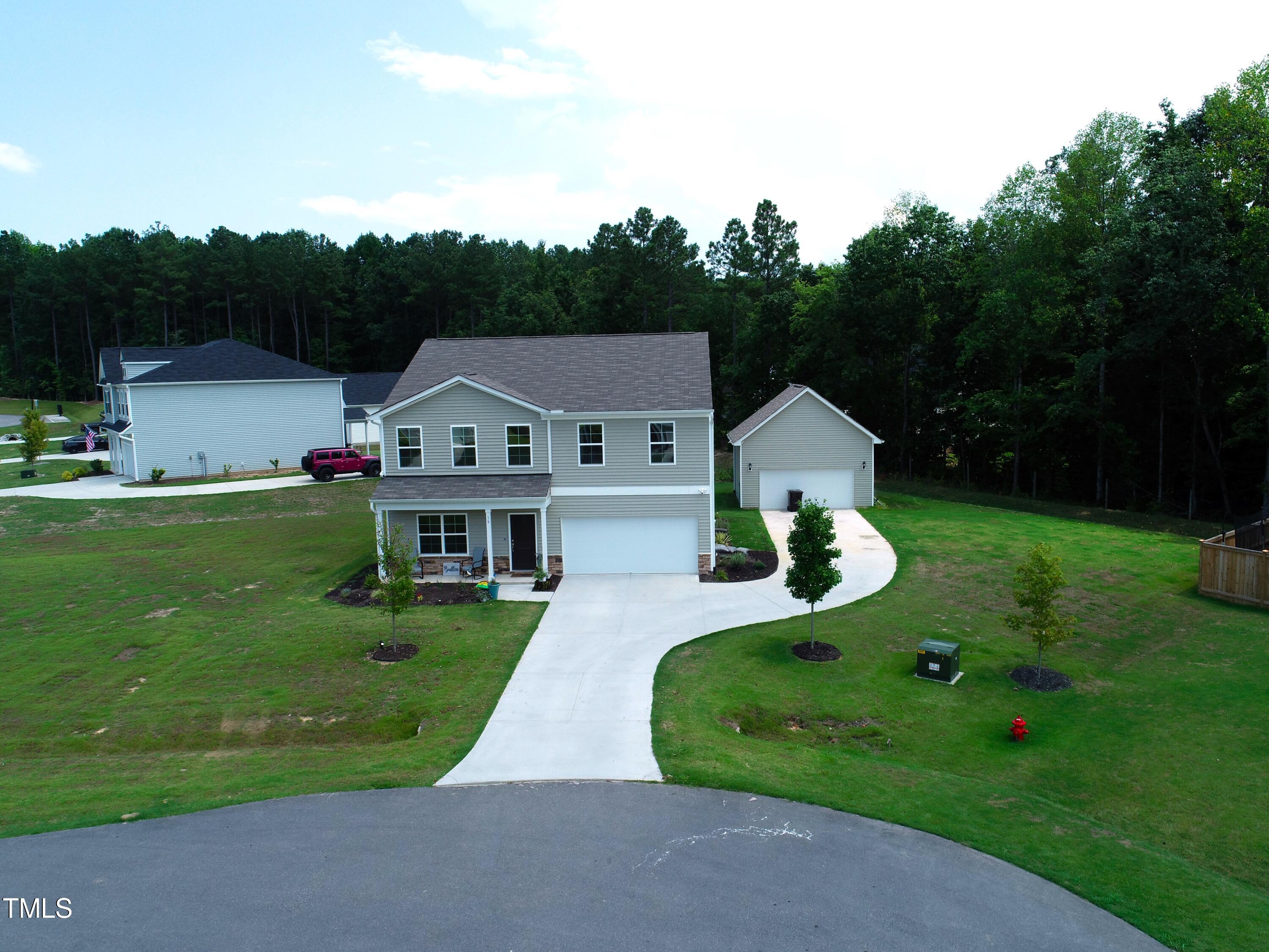 15 New Spring Way Franklinton, NC 27525 - Photo 40 of 41 an aerial view of a house with swimming pool garden view and trees