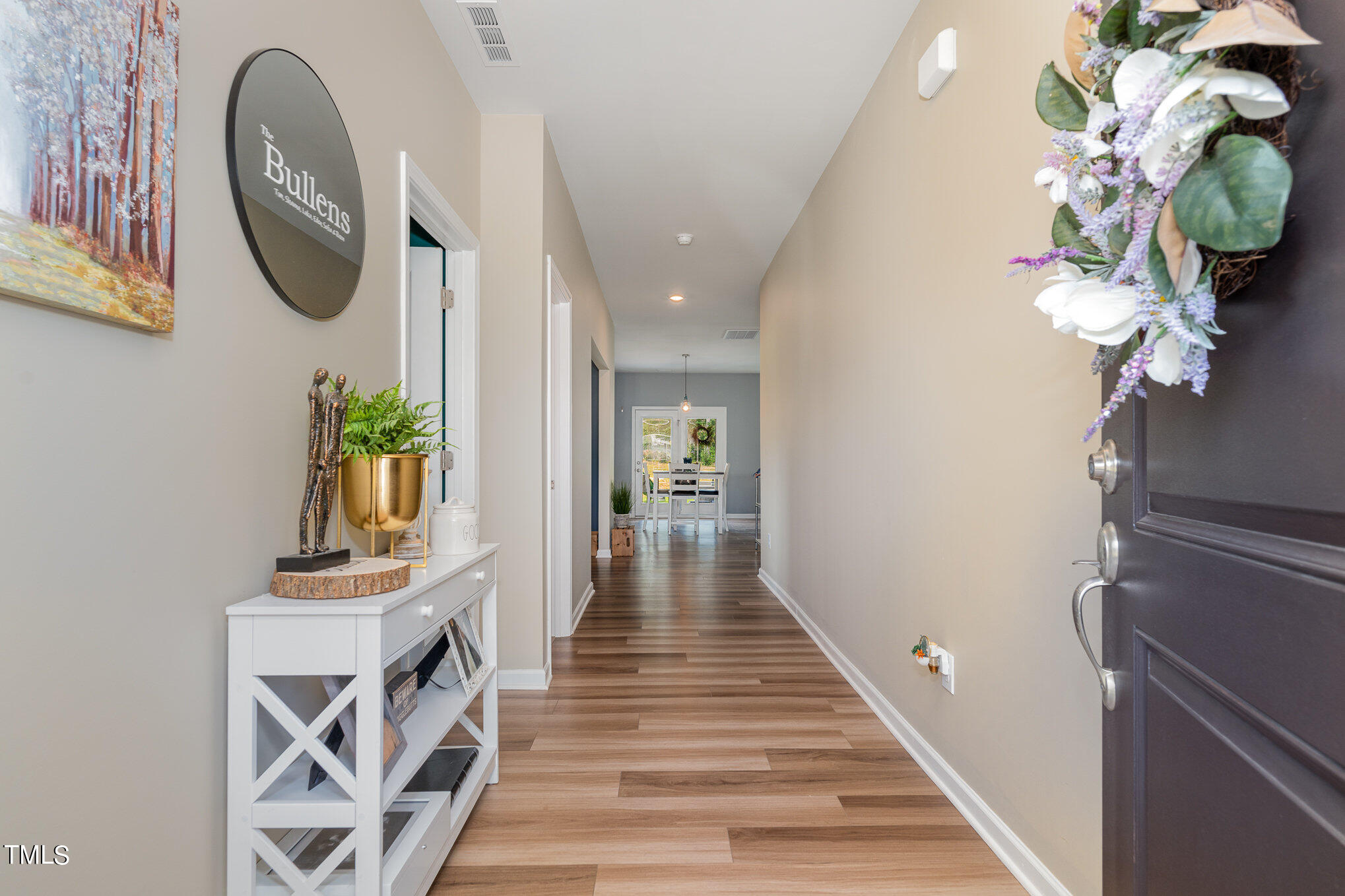 15 New Spring Way Franklinton, NC 27525 - Photo 5 of 41 a view of a hallway with wooden floor