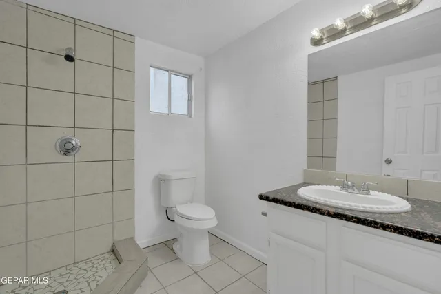 a view of a storage & utility room with racks on the wall