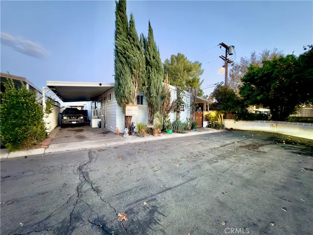a view of road and trees