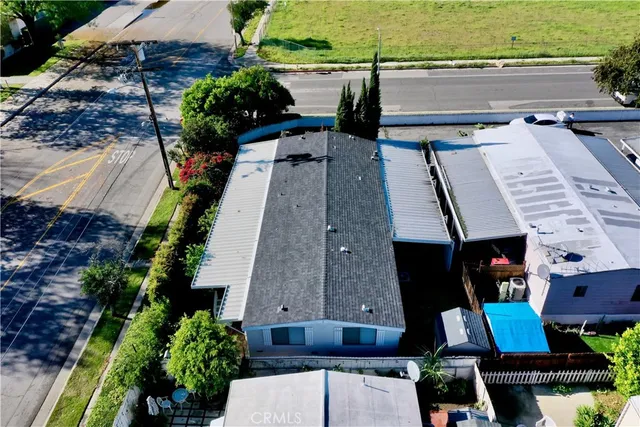 an aerial view of a house with a garden