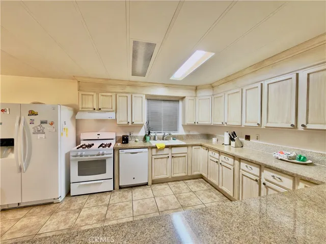a view of storage and utility room with washer and dryer