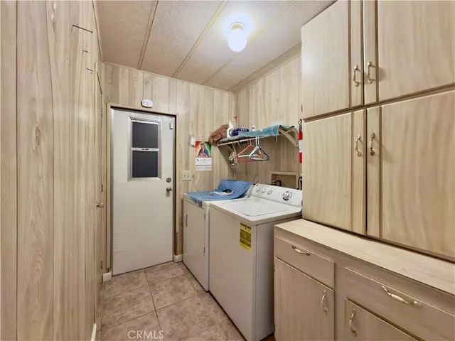 a spacious bedroom with a bed and window