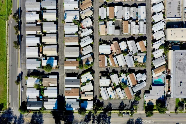 an aerial view of a building with street view