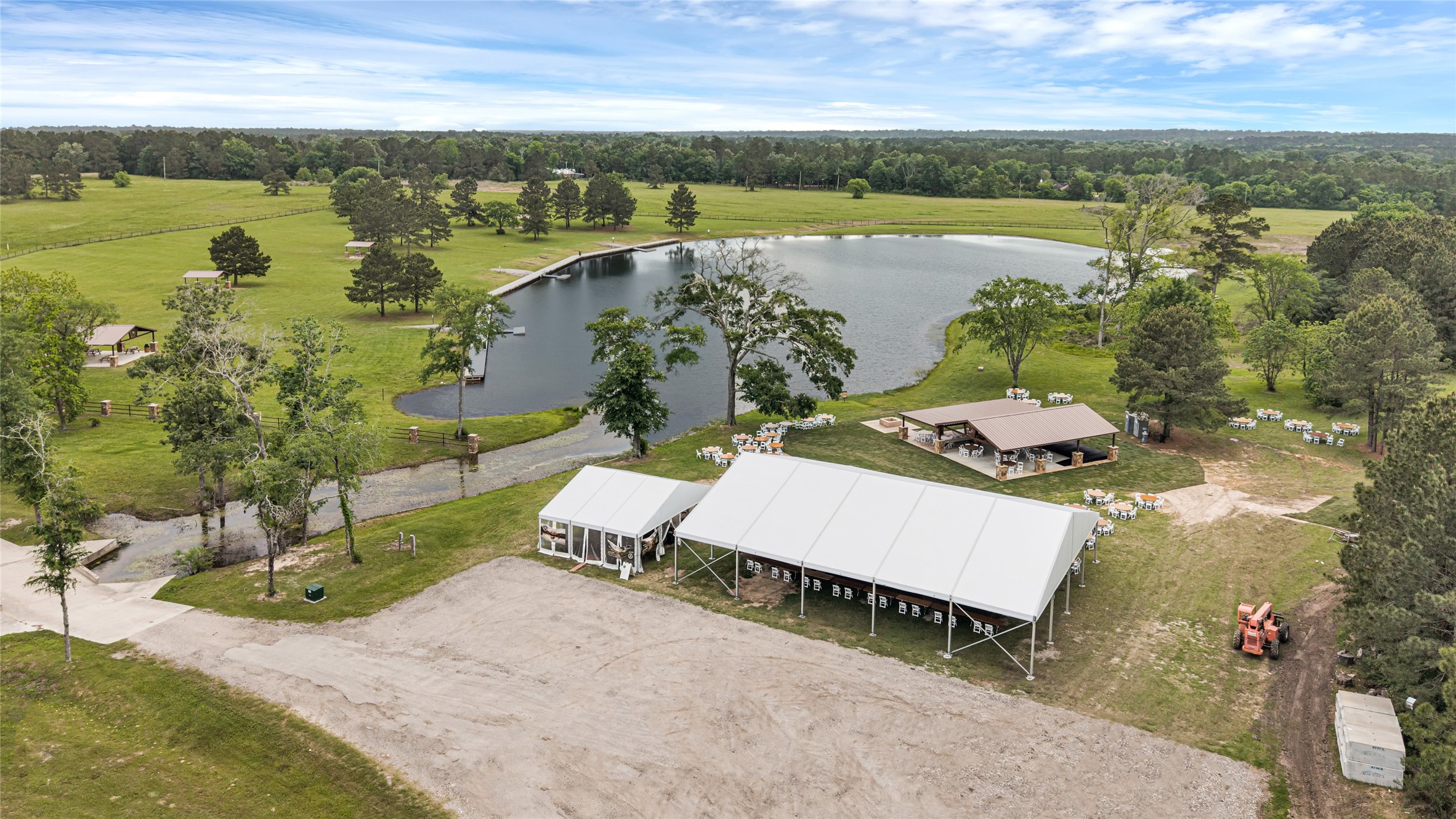 10681 Ruger Road Willis, TX 77378 - Photo 8 of 15 Amenities include an 8 acre stocked fishing pond