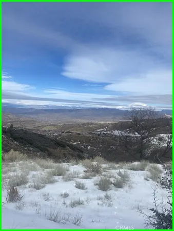 a view of lake with mountain