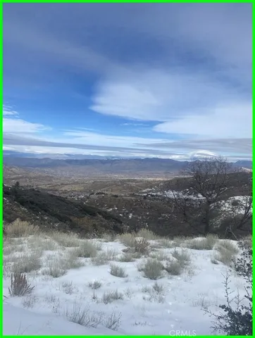 a view of lake with mountain