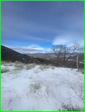 a view of outdoor space with mountain view