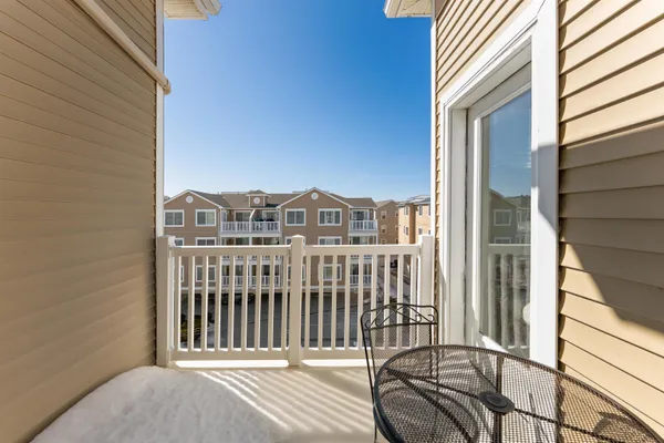 a view of a balcony with a swing