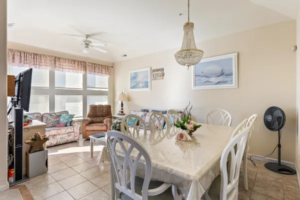 a view of a dining room with furniture window and outside view