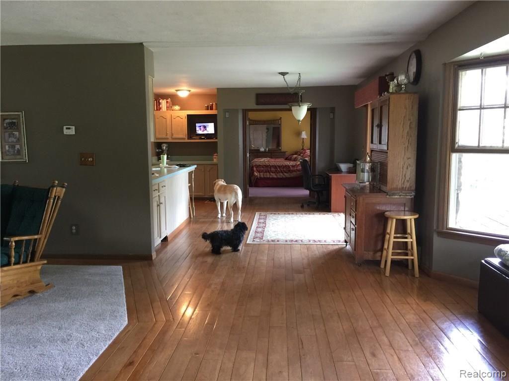 4412 Cedar Lake Road Howell, MI 48843 - Photo 35 of 35 Open floor plan into living room and kitchen (dogs not included!)