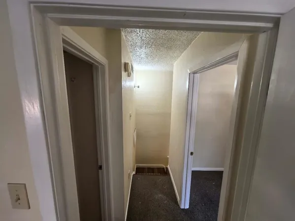 a spacious bathroom with a bathtub sink and toilet