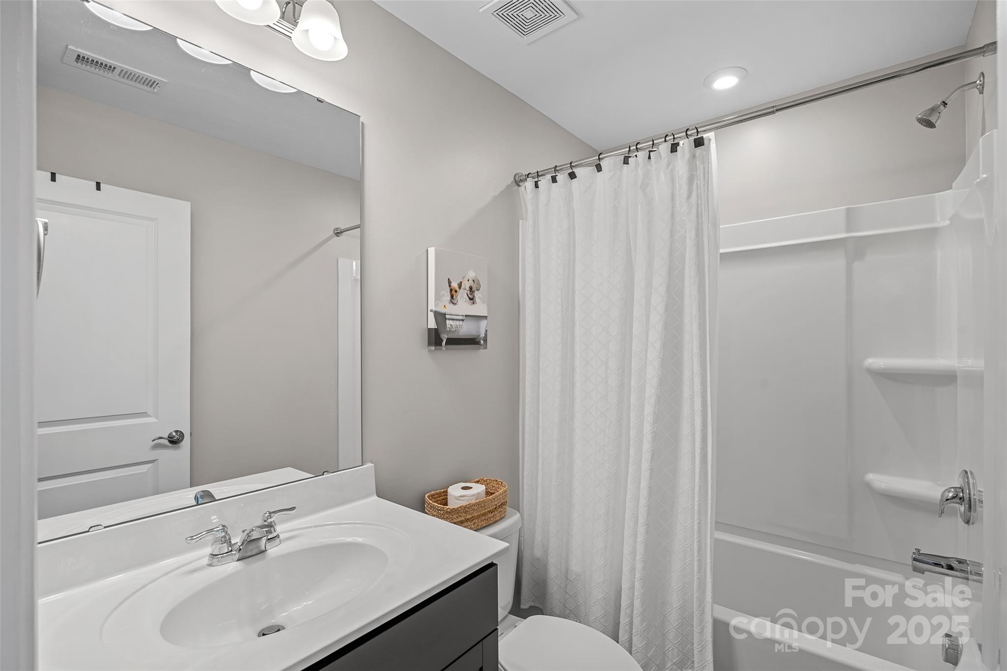 816 Canoe Song Road Fort Mill, SC 29708 - Photo 16 of 26 a bathroom with a sink toilet and shower