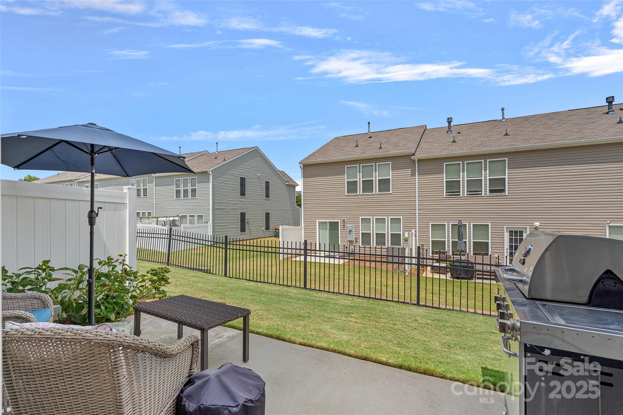816 Canoe Song Road Fort Mill, SC 29708 - Photo 21 of 26 a front view of a house with garden