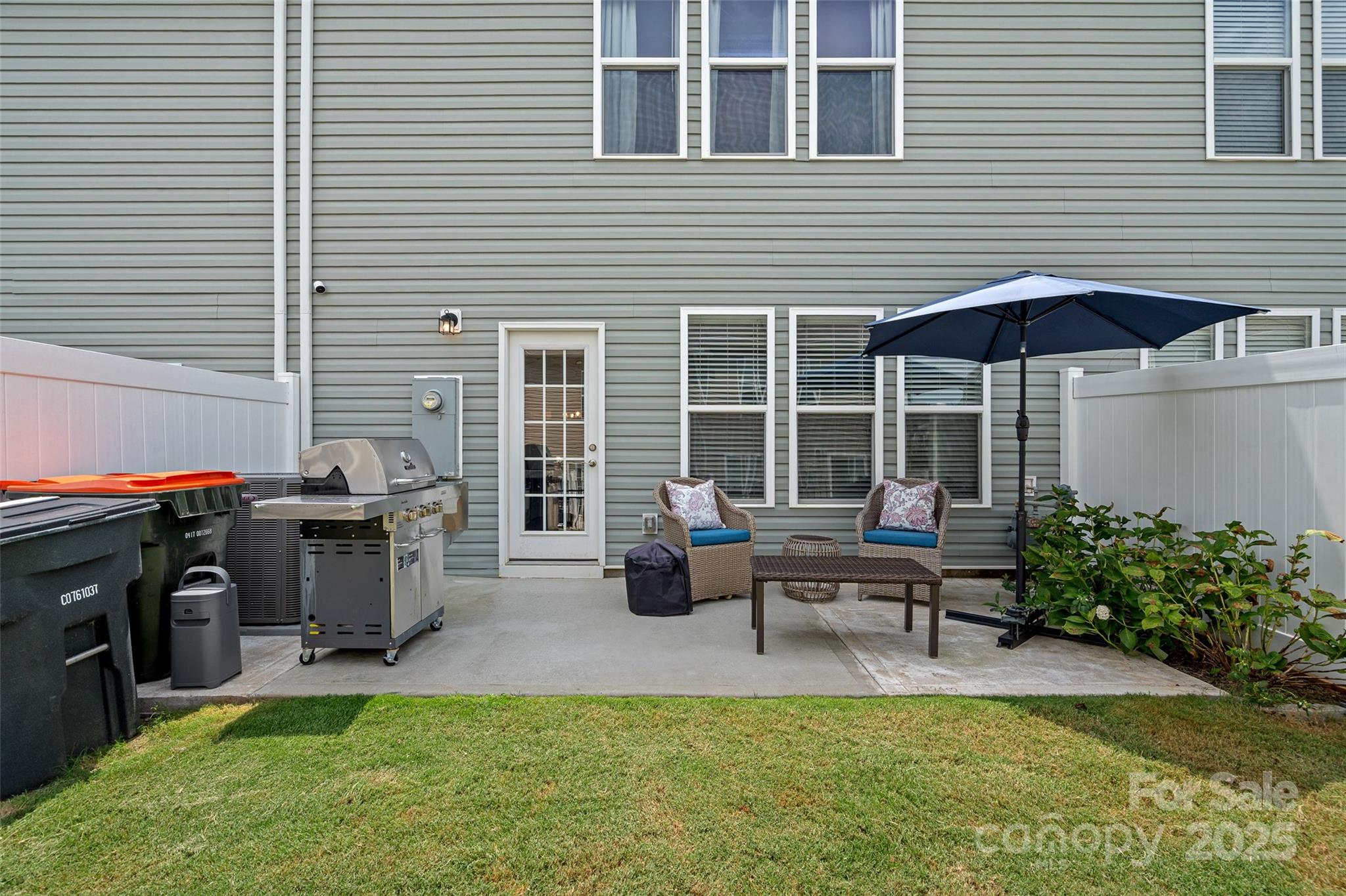 816 Canoe Song Road Fort Mill, SC 29708 - Photo 22 of 26 a view of a house with backyard and sitting area