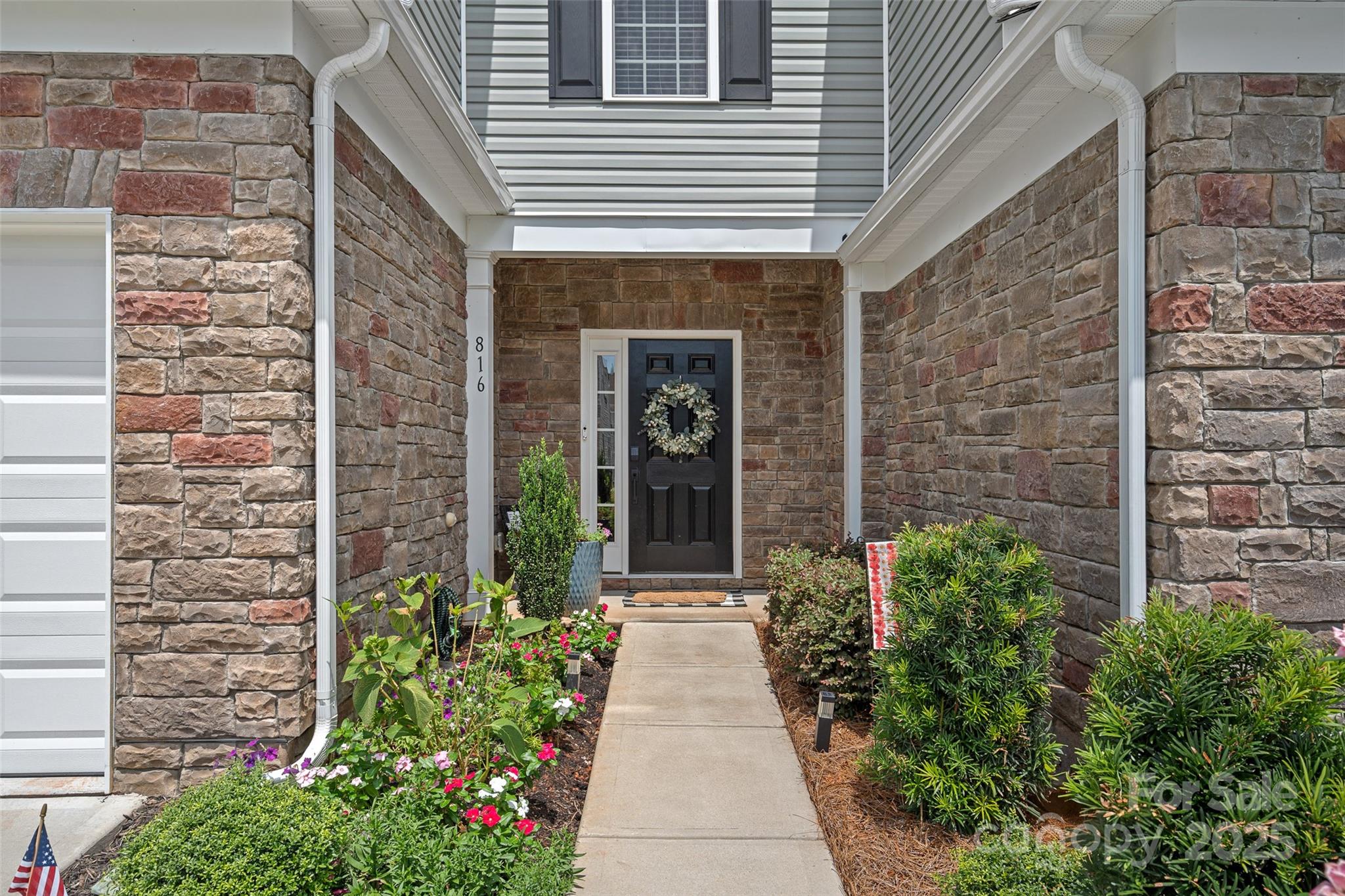 816 Canoe Song Road Fort Mill, SC 29708 - Photo 3 of 26 a view of a pathway with potted plants