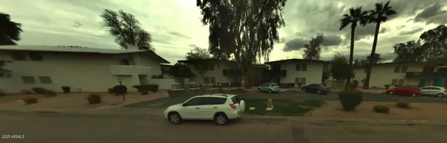 a car parked in front of a house