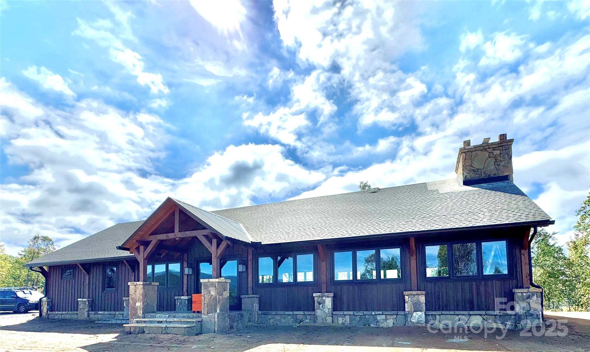 Tbd Bear Paw Road, Unit 15 Elk Park, NC 28622 - Photo 17 of 19 a view of a house with a yard