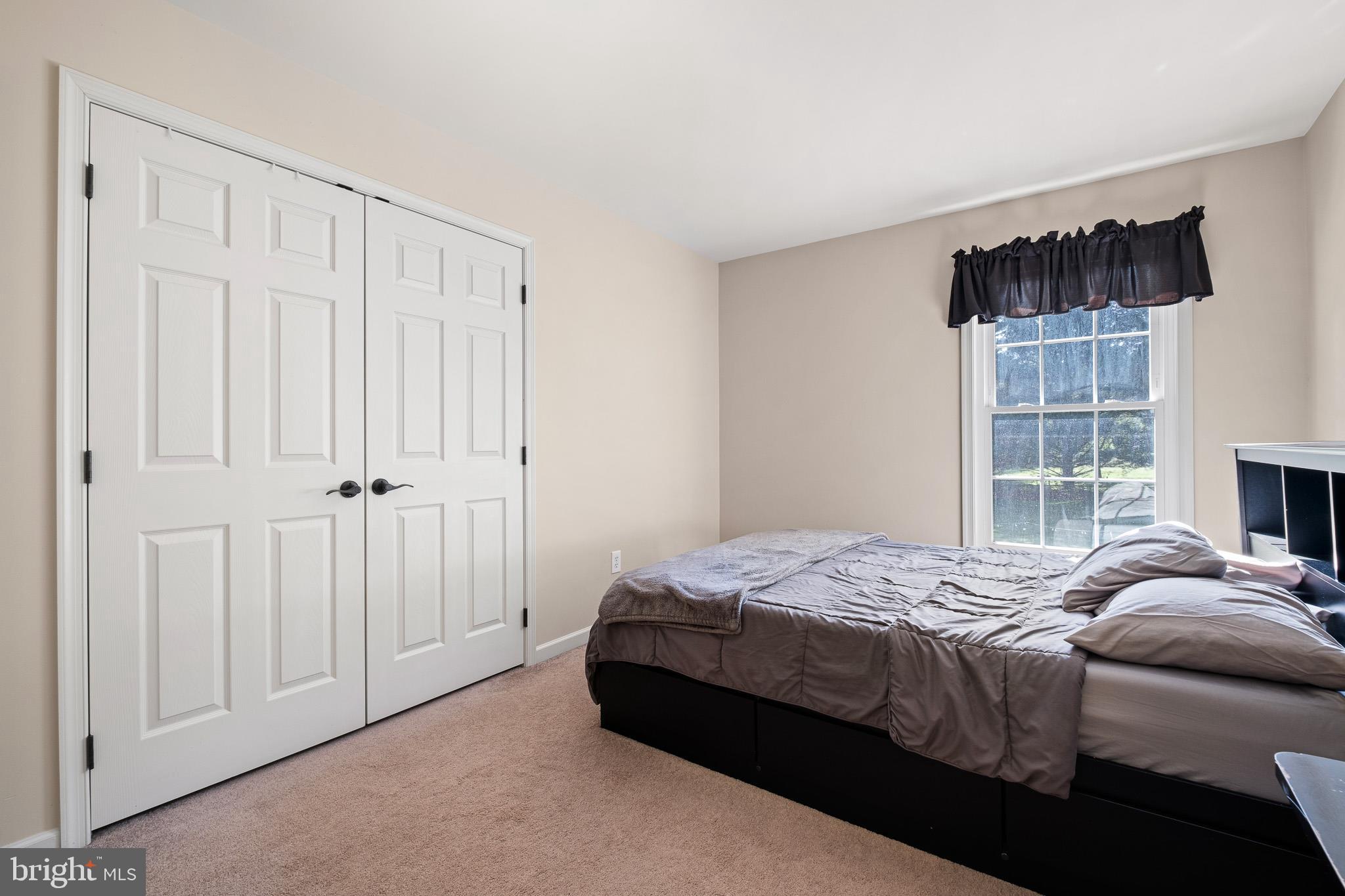1210 Thunder Hill Road Lincoln University, PA 19352 - Photo 45 of 56 a bedroom with a bed a window and walk in closet